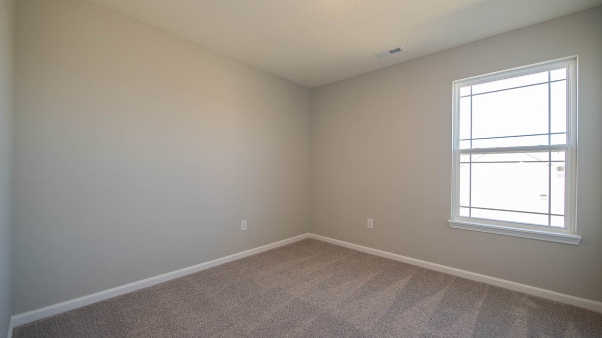 bedroom 2 with large windows