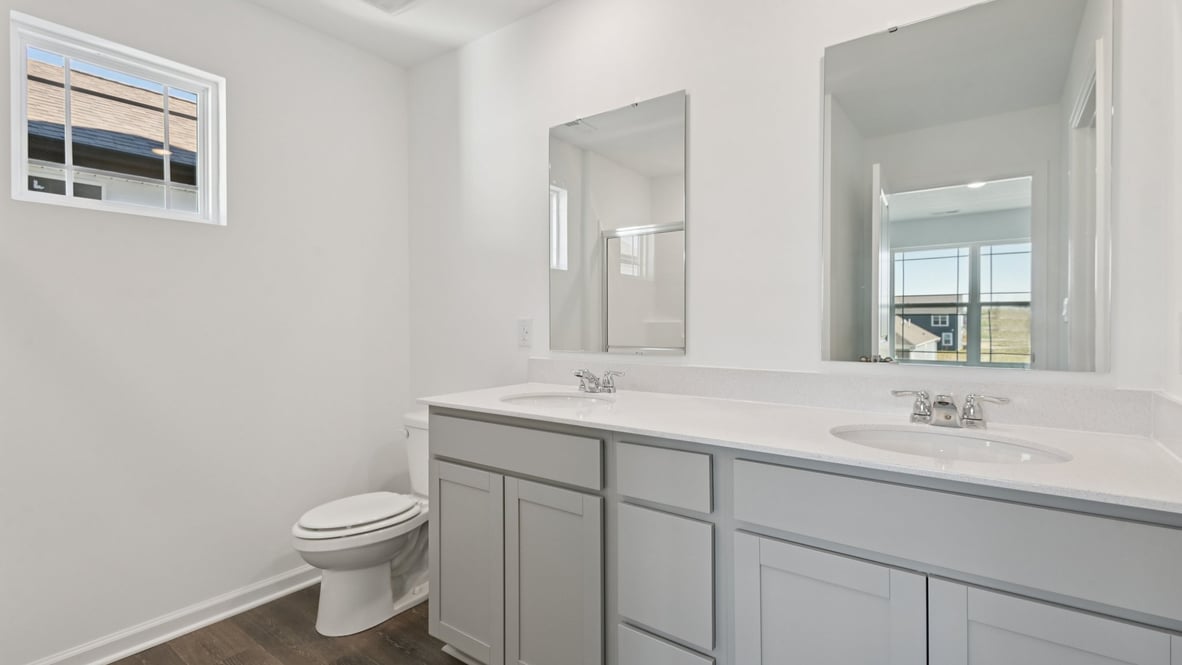 primary bathroom with double vanity