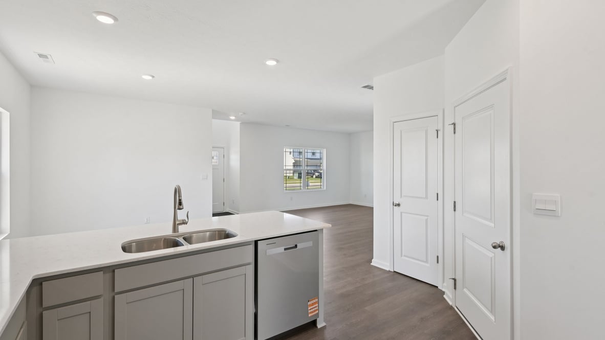 open concept kitchen dining and living area