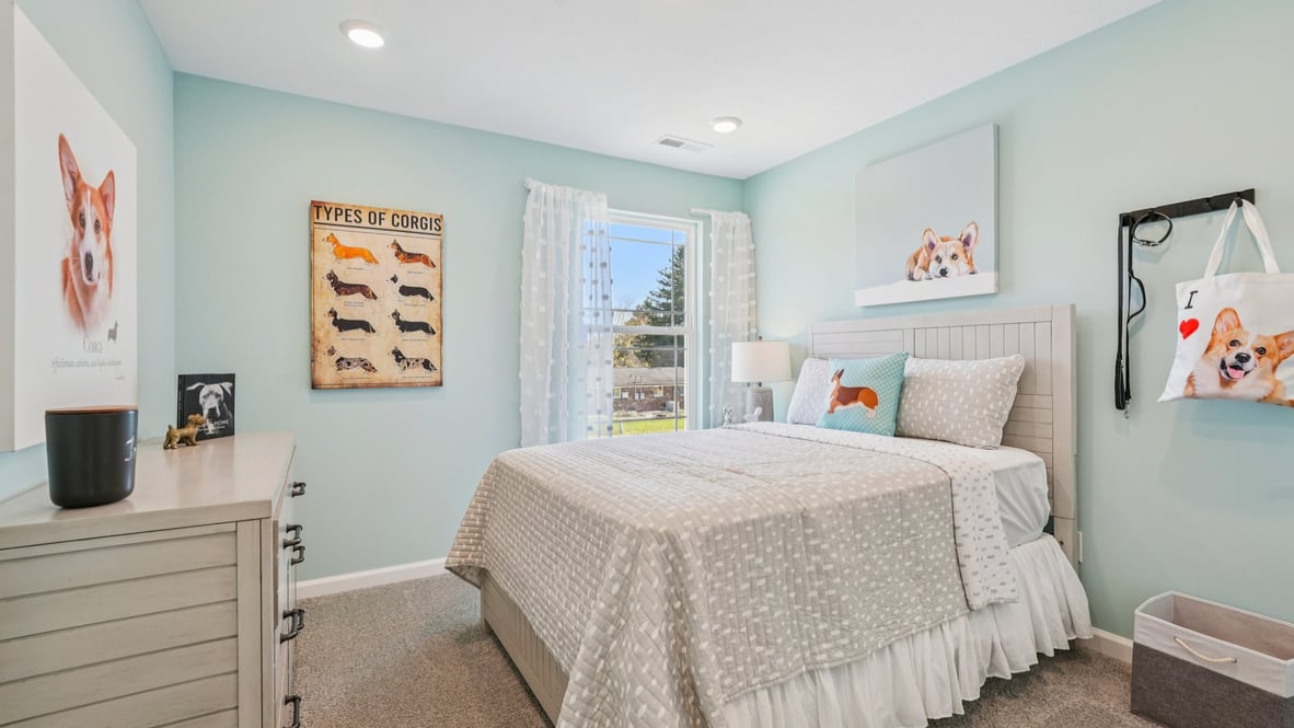 bedroom with full size bed and dresser