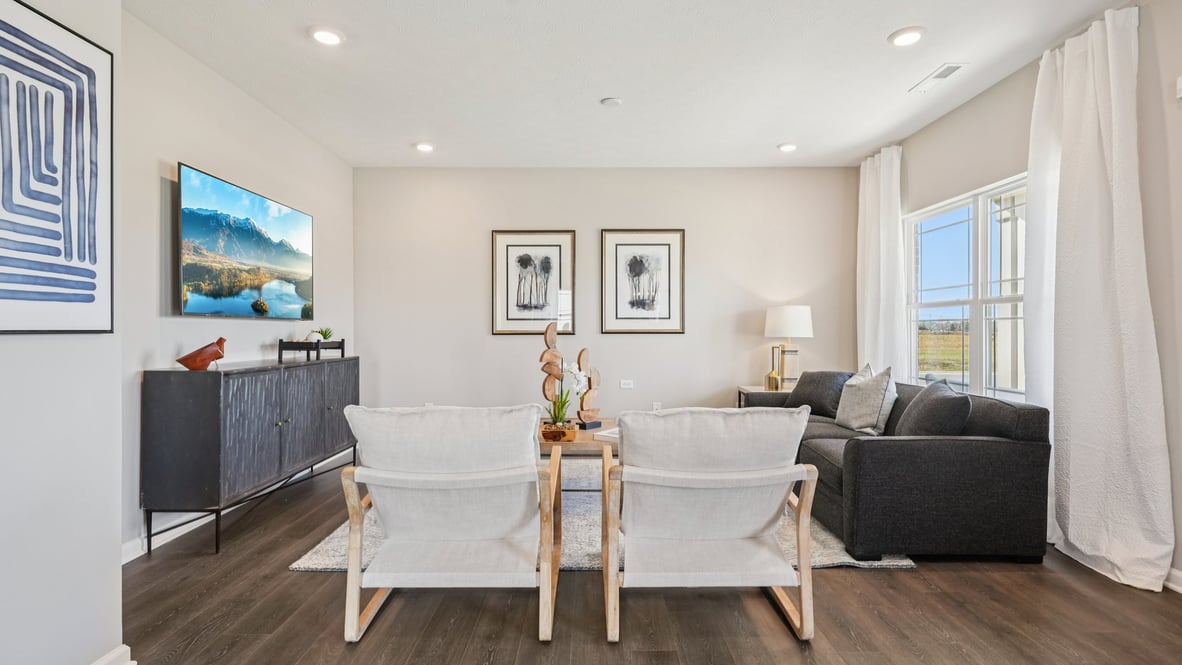 great room with space for couch, coffee table, tv and two chairs