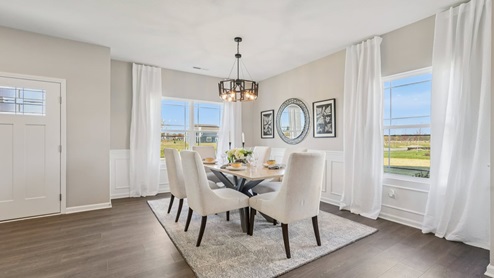 dining area with multiple windows