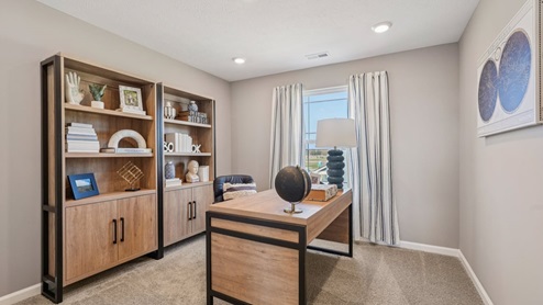 bedroom 2 or home office with desk and shelving