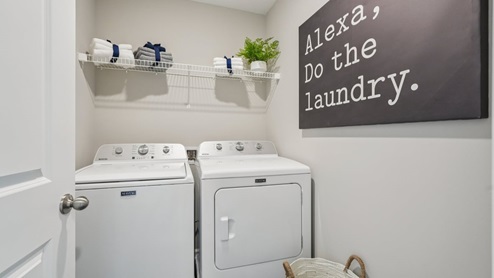 upper level laundry room and shelving