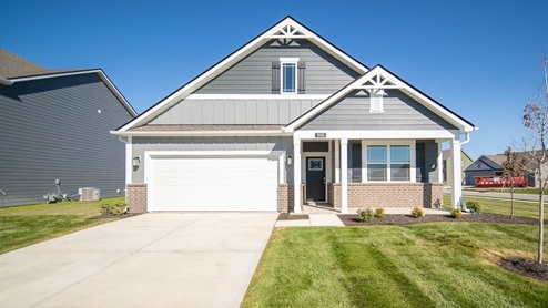 single story home with front porch and 2-car garage