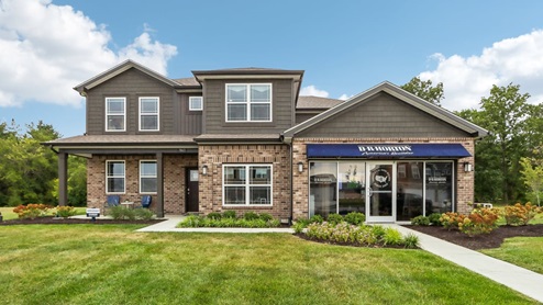 model home with brown color scheme exterior