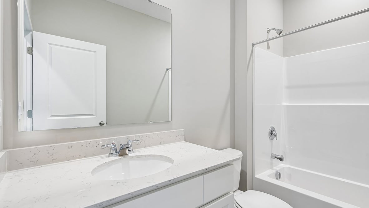 bathroom with shower and tub combo