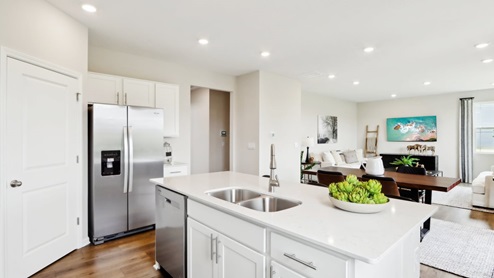 kitchen with large corner pantry