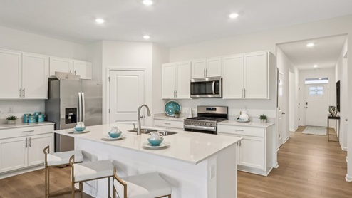 kitchen with large corner pantry