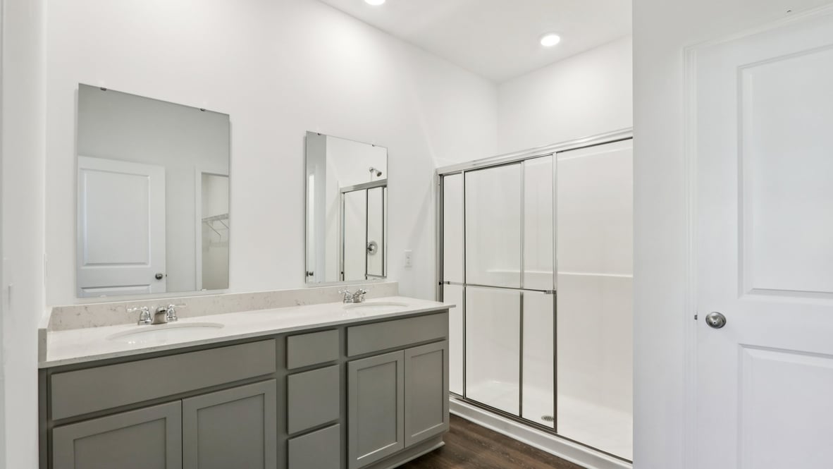 primary bedroom with stand up shower