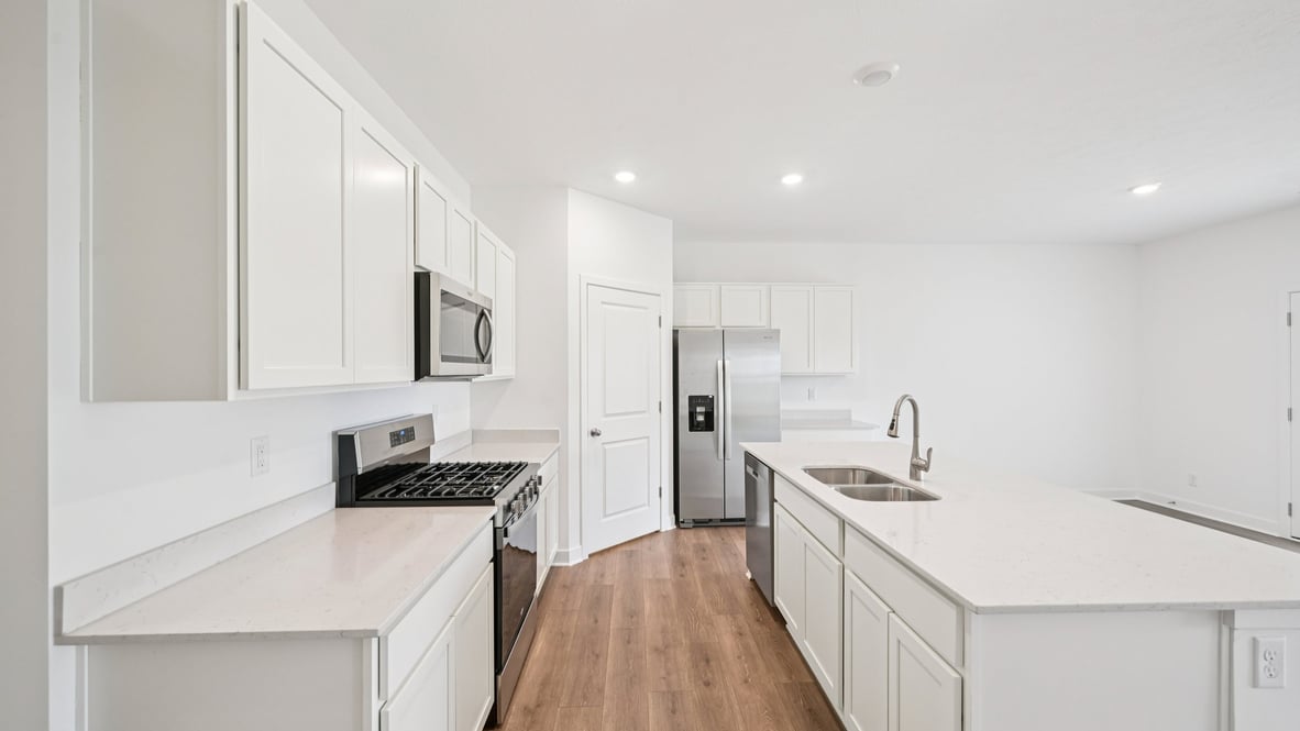 kitchen with large corner pantry