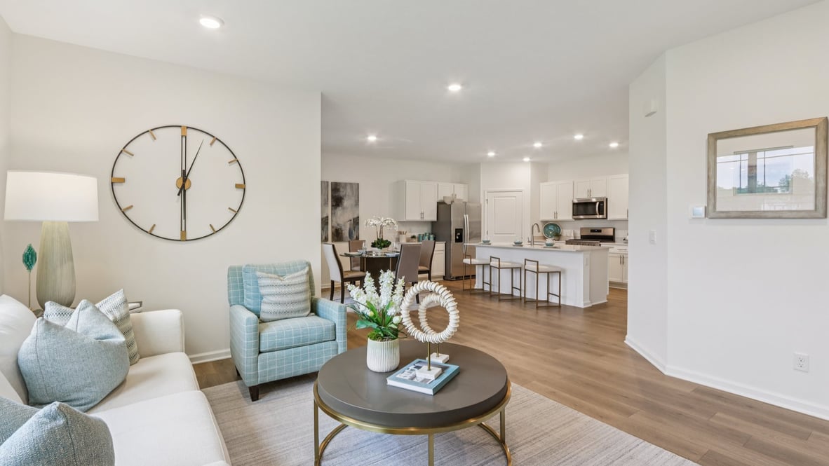open concept great room dining nook and kitchen