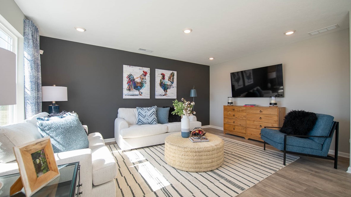 The great room is filled with light and easy access to patio