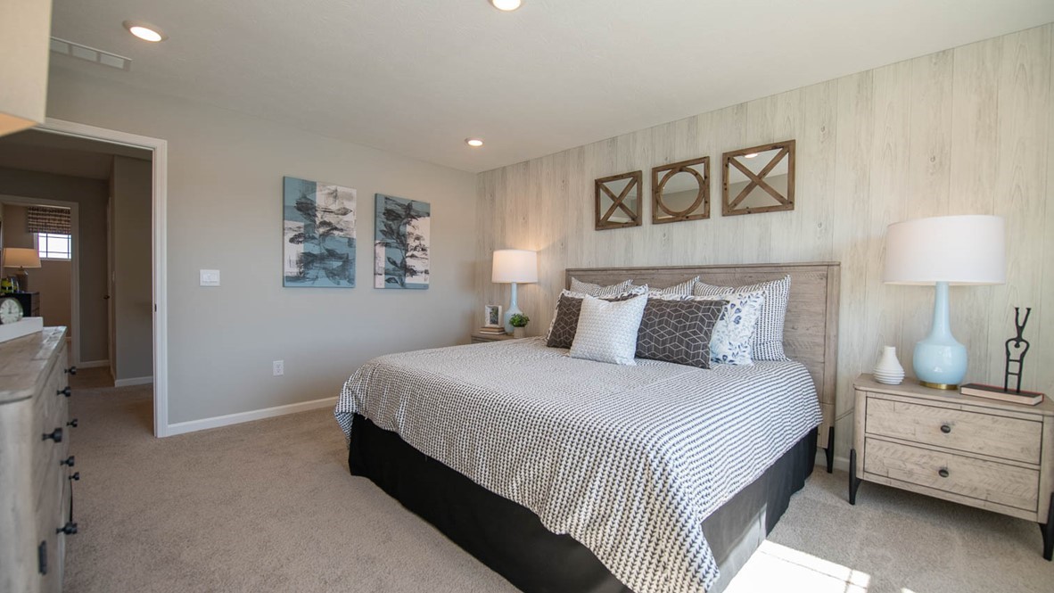 Primary bedroom is situated overlooking the backyard