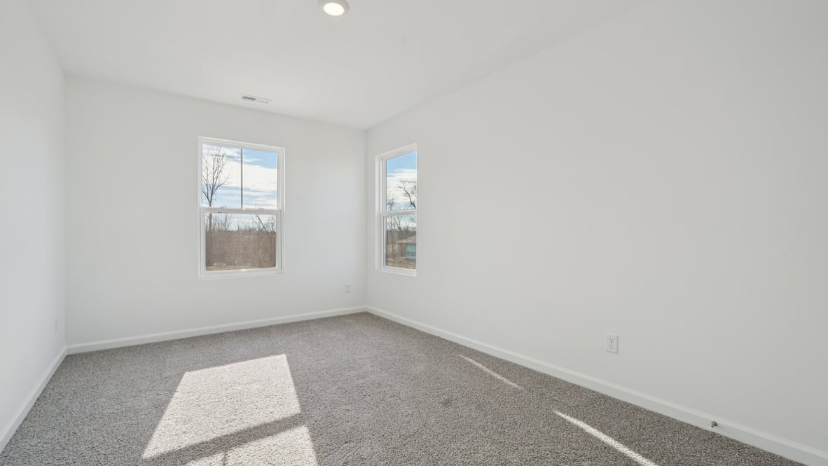 bedroom with large windows