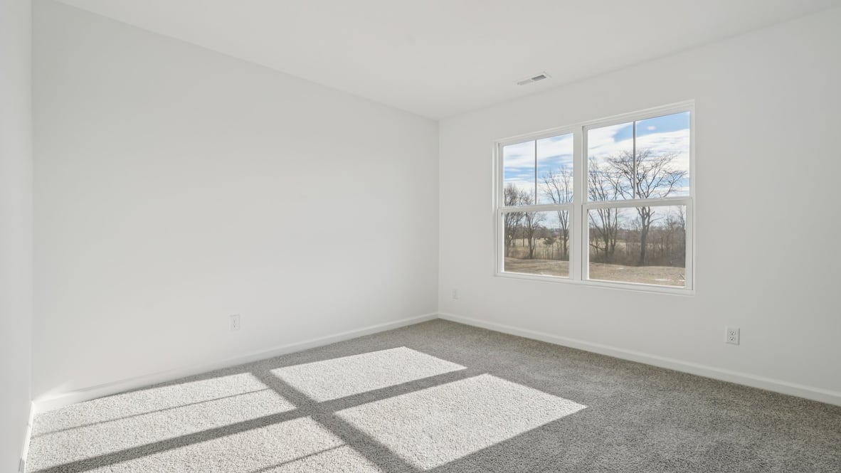 bedroom with large windows