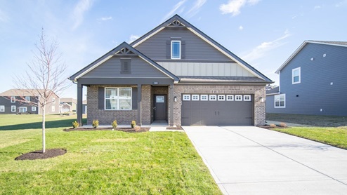 single story home exterior with dark trim