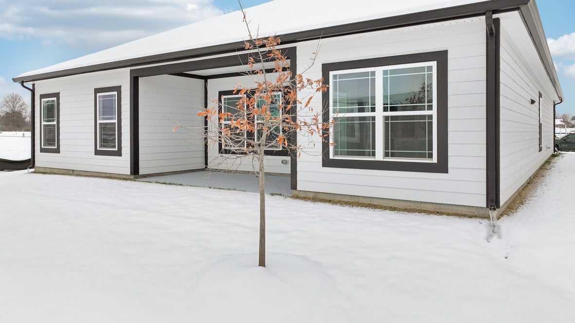 Rear yard view highlighting outdoor space and patio connection