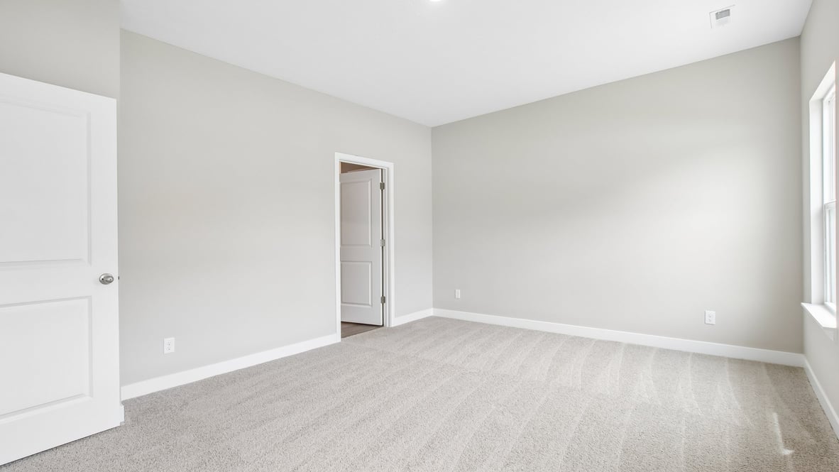 spacious primary bedroom