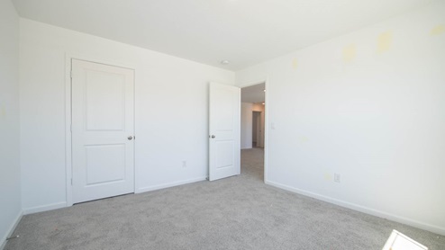 A third bedroom contains generous closet space