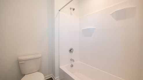 Hall bath features a tub shower