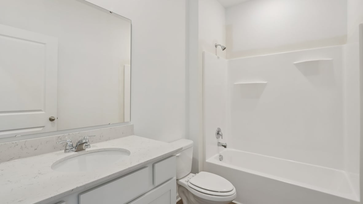 bathroom with shower and tub combo