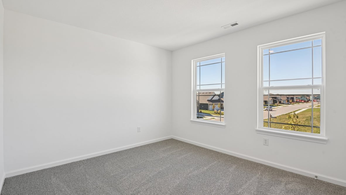 bedroom with large windows