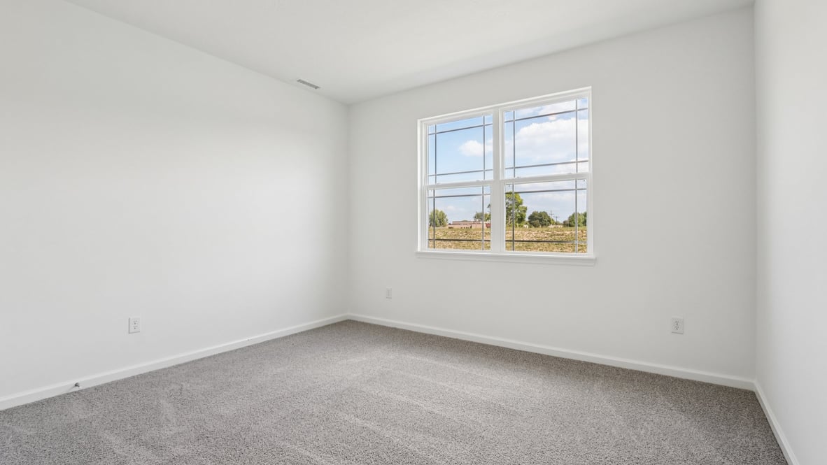 bedroom with large windows