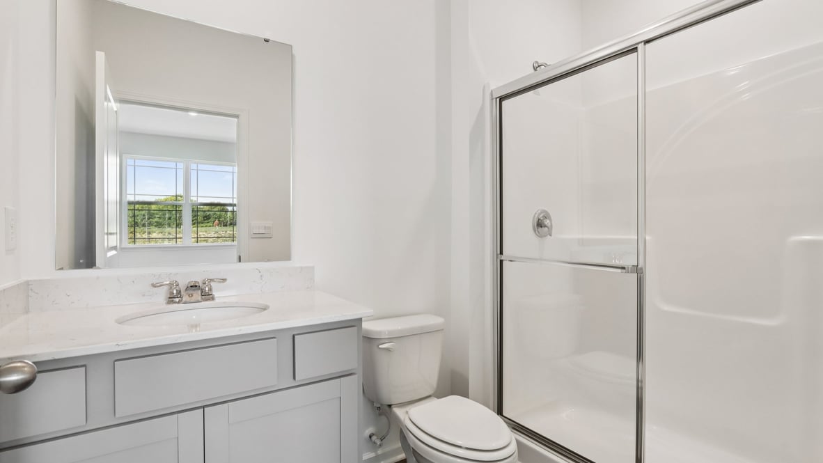 bathroom with walk-in shower