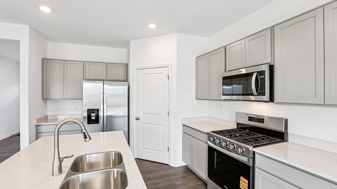 kitchen with large corner pantry