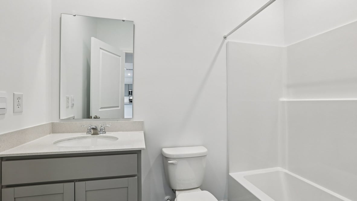 bathroom with shower and tub combo