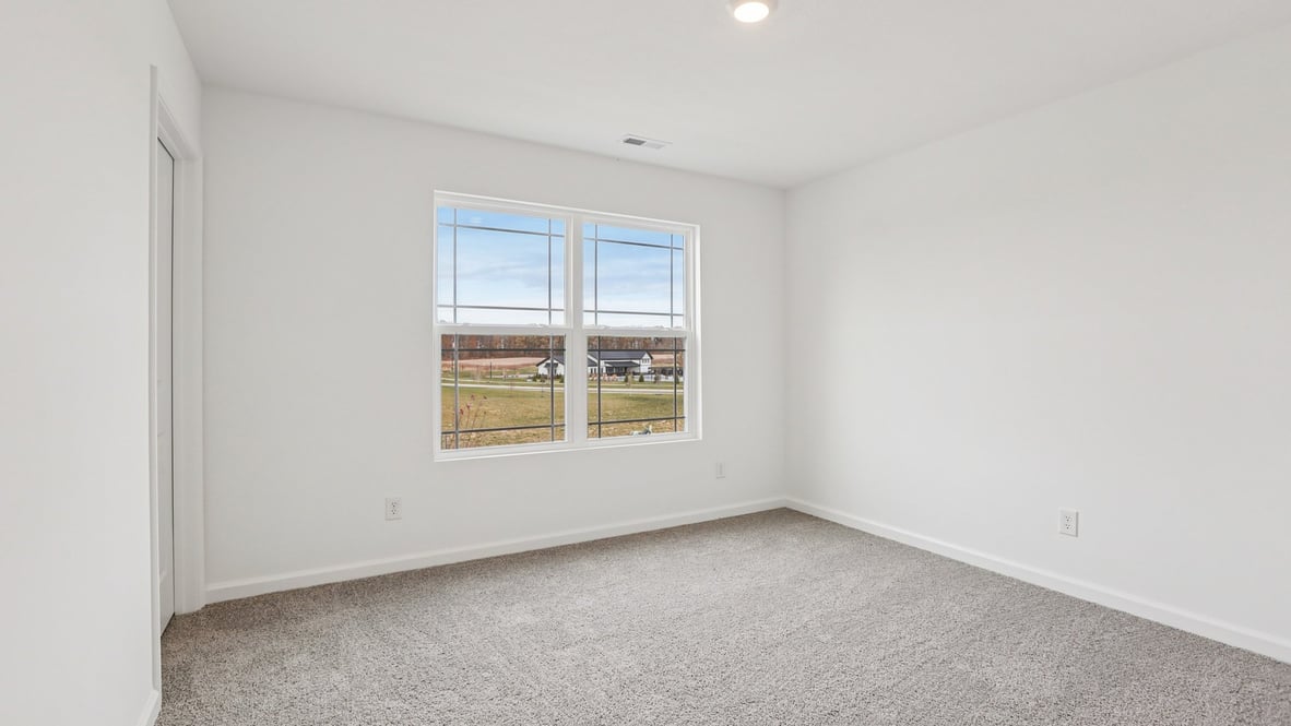 bedroom with large windows