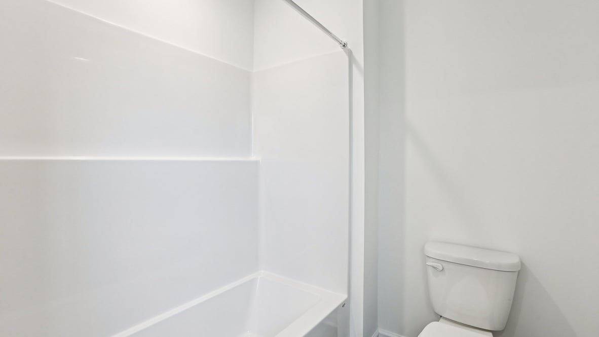 bathroom with shower and tub combo