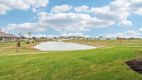 backyard view of the pond from the chatham model home