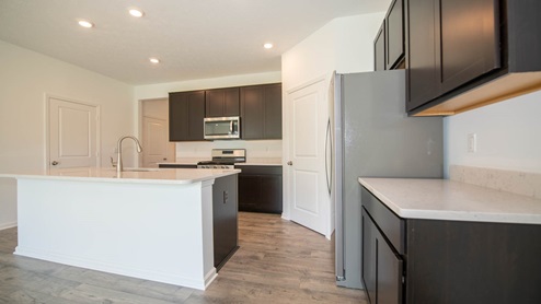 kitchen with white cabinets and center island