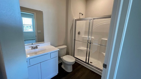 main level bathroom with shower
