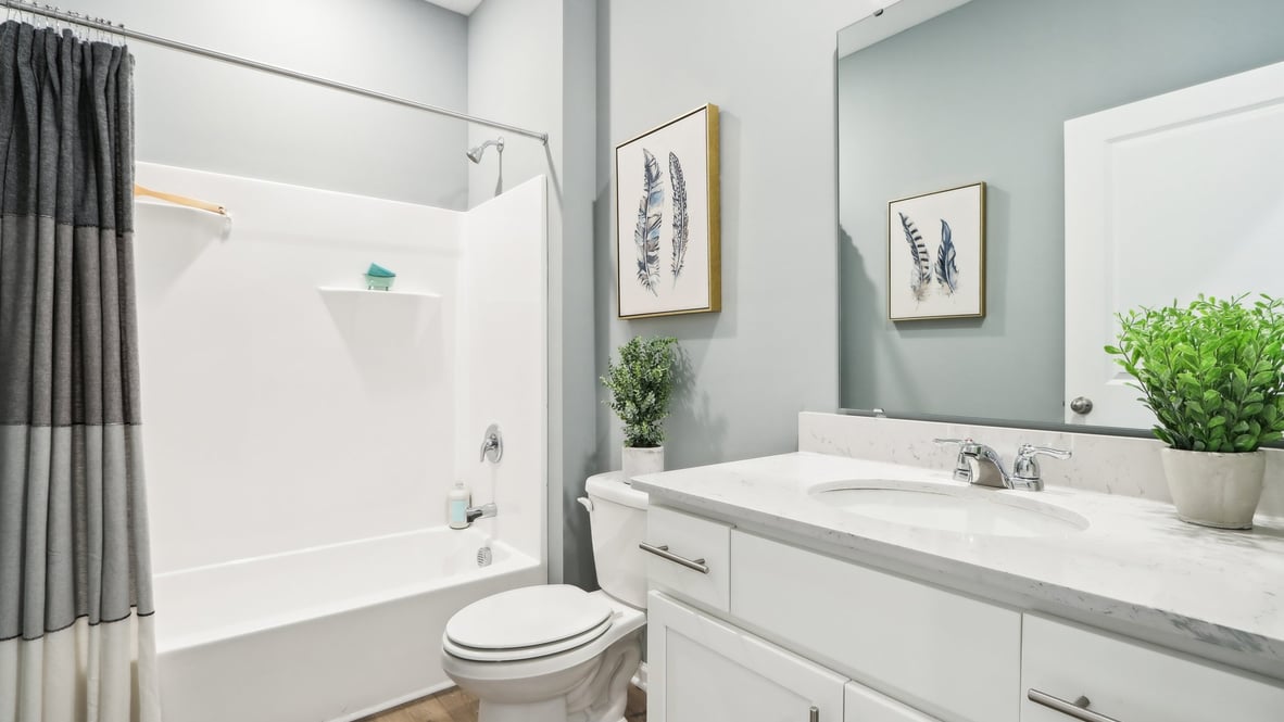bathroom with shower and tub combo