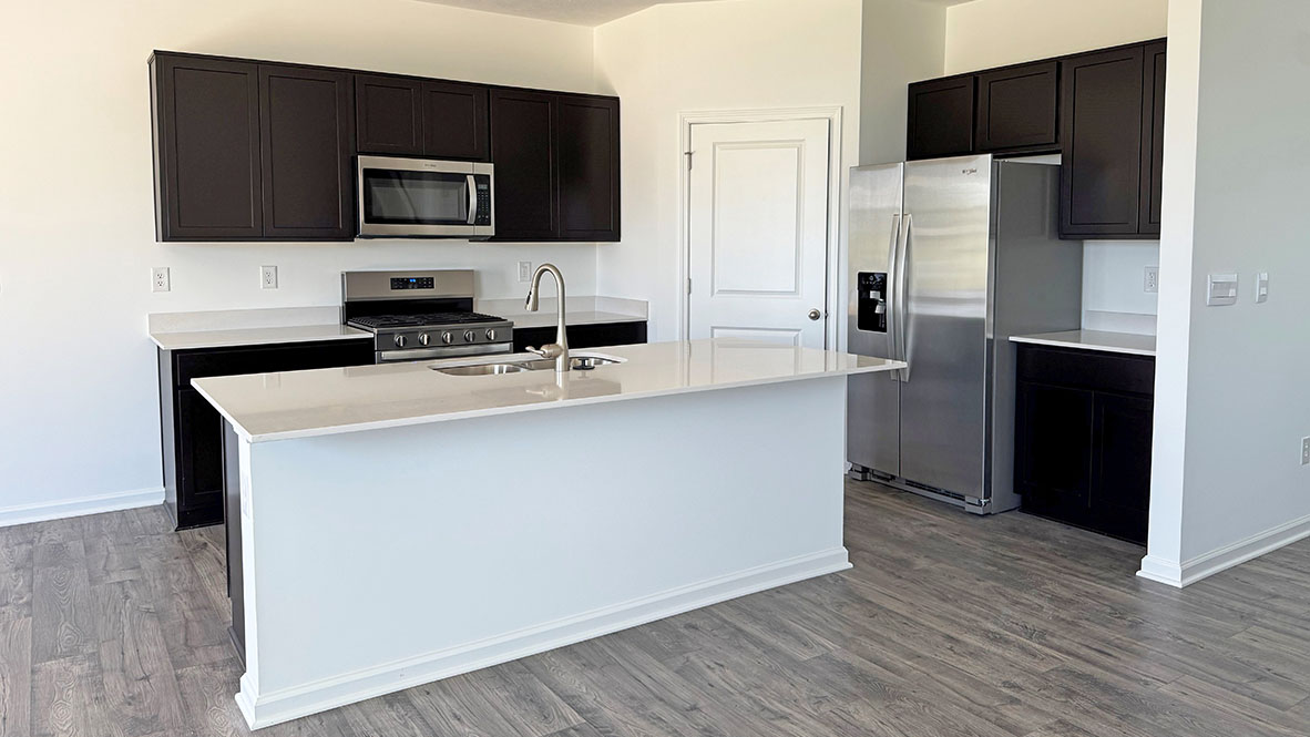 kitchen with sarsparilla cabinetry