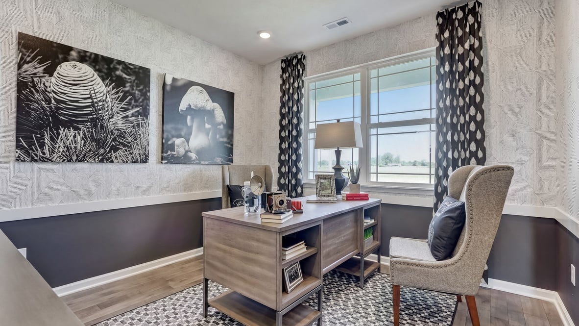 den with paint detail and wallpaper