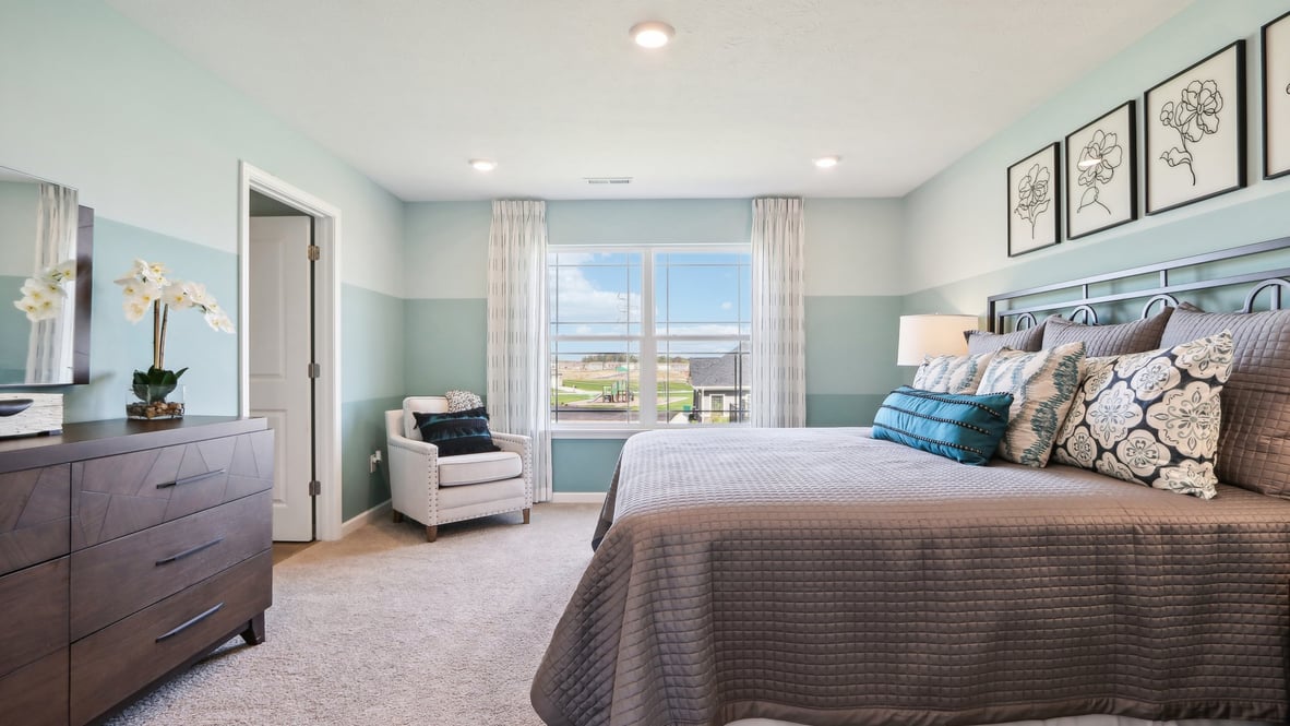 primary bedroom with reading chair