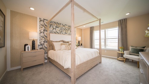 primary bedroom with large windows
