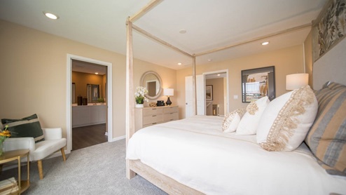 primary bedroom with open-concept