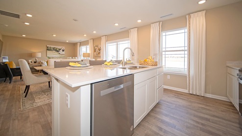 kitchen overlooks the dining area and great room