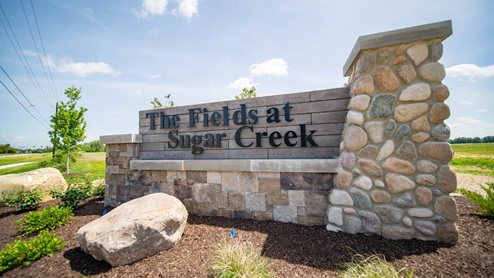 fields at sugar community entrance