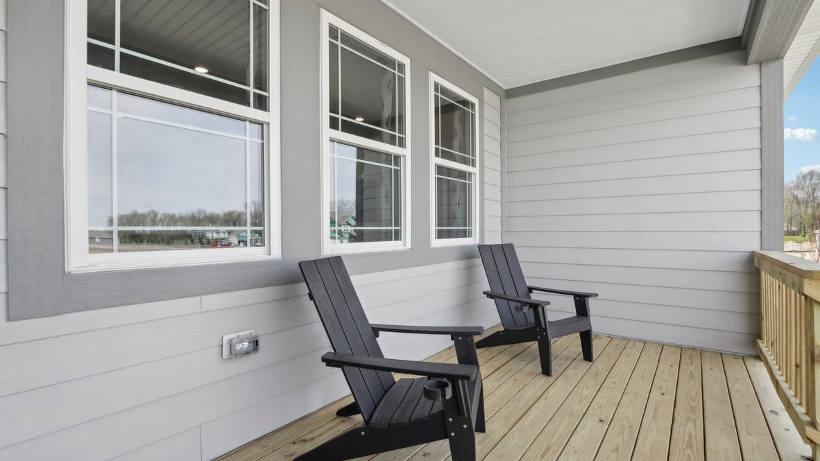 covered patio on the back of the home