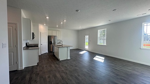 kitchen with laminate flooring and island