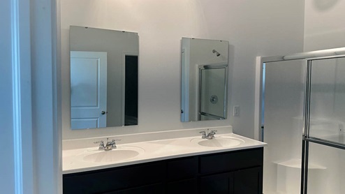 primary bathroom with double bowl vanity