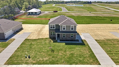 large yard aerial view of front