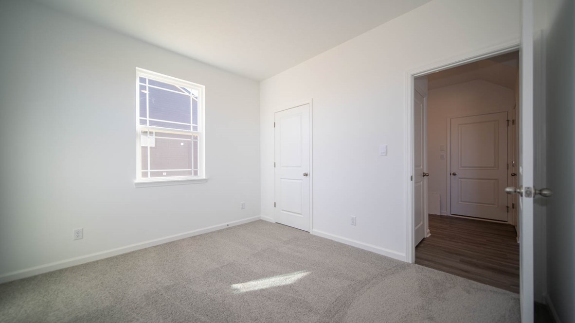 guest bedroom with spacious closet