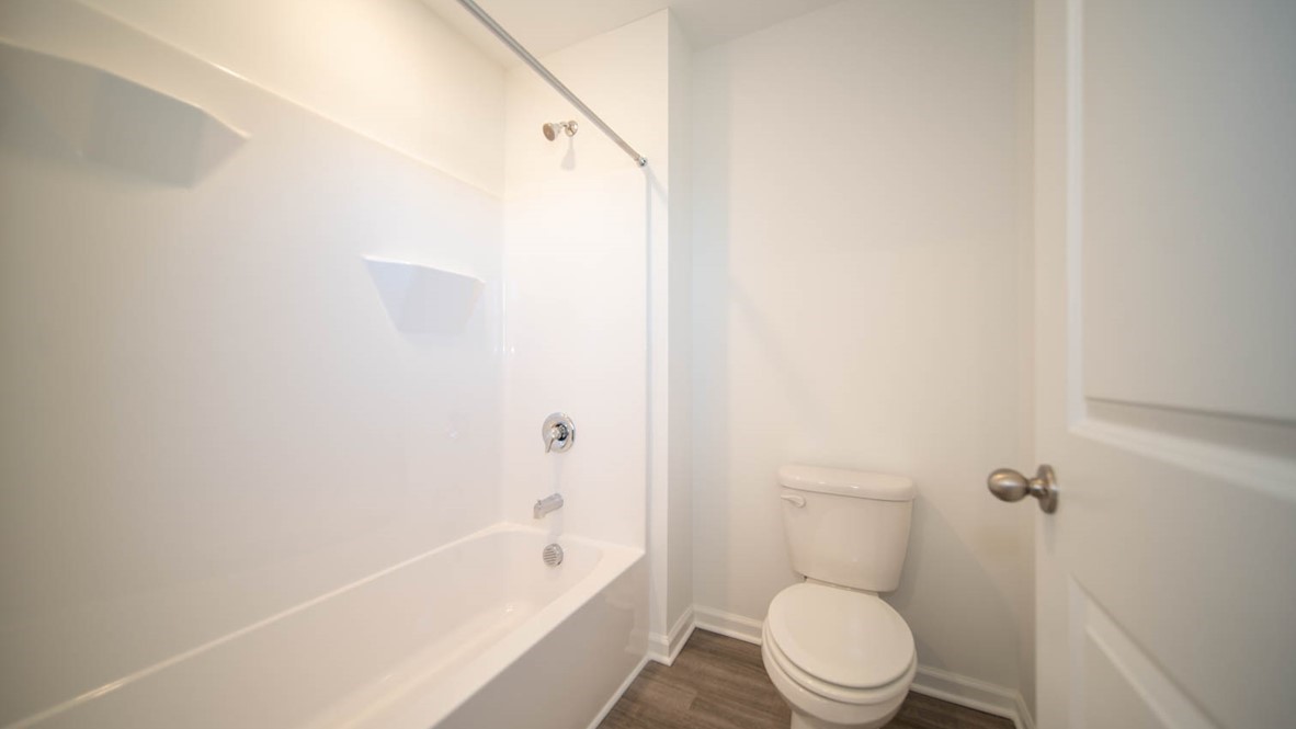 bathroom with shower and tub combo